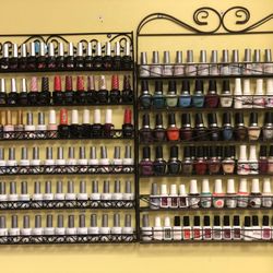 Paradise Spa - Wide variety of gel nail polishes including brands such as: Gelish, Gel II, Perfect Match, Cuccio, Essie, OPI, Daisy...