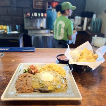 Green Chile Kitchen - Flat Enchiladas with green chili, rice & beans. - Mexican Near Me - Yukon, Oklahoma