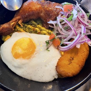 Jora - Arroz con Pollo - Peruvian Near Me - Long Island City, New York Jora - Arroz con Pollo - Peruvian Near Me - Long Island City, New York