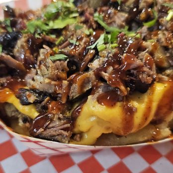 Jackie’s Place - Close-up of the Scoop's "Not Yo" Nachos with Smoked Beef Brisket - Soul Food Near Me - San Jose, California Jackie’s Place - Close-up of the Scoop's "Not Yo" Nachos with Smoked Beef Brisket - Soul Food Near Me - San Jose, California