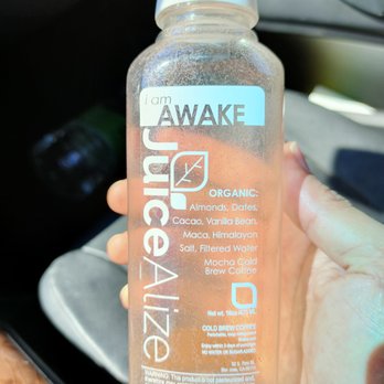 JuiceAlize - a hand holding a bottle of juice - Juice Bars & Smoothies Near Me - San Jose, California JuiceAlize - a hand holding a bottle of juice - Juice Bars & Smoothies Near Me - San Jose, California
