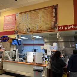 In the way back and on the right side of the grocery store if you're facing the entrance.