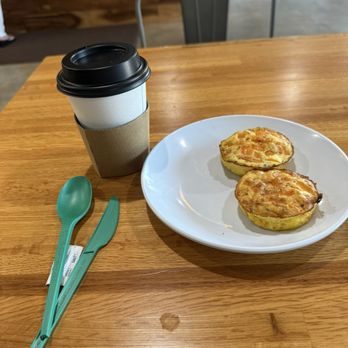 I Need Coffee - Cappuccino with almond milk and homemade brown sugar, cinnamon syrup for sweetener. And freshly made egg bites with peppers. - Coffee Roasteries Near Me - Jupiter, Florida
