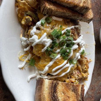 The Ugly Rooster Cafe - Farmer's Scramble with marbled rye toast - Breakfast & Brunch Near Me - Malta, New York The Ugly Rooster Cafe - Farmer's Scramble with marbled rye toast - Breakfast & Brunch Near Me - Malta, New York