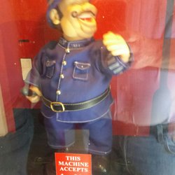 Bressingham Steam Museum and Gardens - Laughing Policeman in old - time fairground