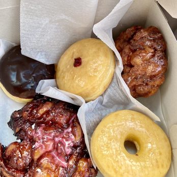 Doughboy Donuts - My selection this morning! Bavarian cream, raised glazed, raspberry filled, mini fritter and cherry fritter!! - Donuts Near Me - Sparks, Nevada