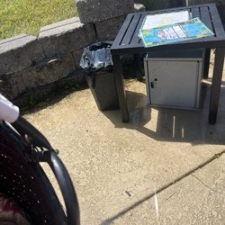 WaterWorks Park - Flooded area around day bed. Unable to use lock box because it was full of water.