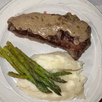 French Quarter Bistro - Steak cooked well (medium rare) but maybe too much fat but who doesn't love a little fat right - French Near Me - Saint Thomas, Virgin Islands