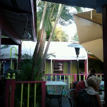 The Real Macaw - Outdoor bar view. - Seafood Near Me - Naples, Florida The Real Macaw - Outdoor bar view. - Seafood Near Me - Naples, Florida