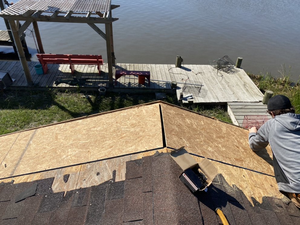 Slide of Roof repair & leak experts - NOLA