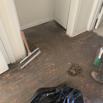 Evolution Flooring - After carpet and linoleum torn up - ready for sanding - Flooring Near Me