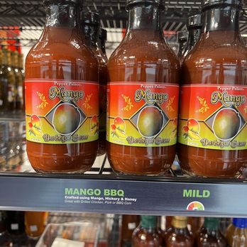 Pepper Palace Niagara Falls - a display of mango bbq sauces - Grocery Near Me - Niagara Falls, Ontario Pepper Palace Niagara Falls - a display of mango bbq sauces - Grocery Near Me - Niagara Falls, Ontario