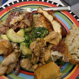 Mix of four dishes, two half spring rolls (a regular one, and another the size of a croissant!) Mix of four dishes, two half spring rolls (a regular one, and another the size of a croissant!)