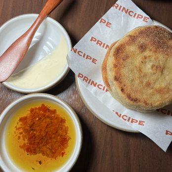 Principe - Complimentary bread service w/ goat cheese butter & Calabrian chili oil - Seafood Near Me - New York, New York Principe - Complimentary bread service w/ goat cheese butter & Calabrian chili oil - Seafood Near Me - New York, New York