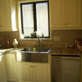 AMT Construction - a kitchen with a sink and dishwasher - General Contractors Near Me - Belmont, California AMT Construction - a kitchen with a sink and dishwasher - General Contractors Near Me - Belmont, California