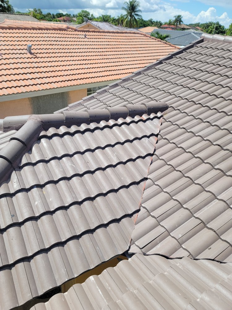 Slide of JMR Roofing Services