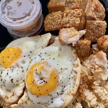 Casa de Empanada - Pork belly chicharon with fried rice and eggs - Empanadas Near Me - Las Vegas, Nevada Casa de Empanada - Pork belly chicharon with fried rice and eggs - Empanadas Near Me - Las Vegas, Nevada