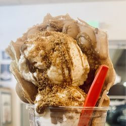 Sweet Stax Cafe - Lotus cookie butter bubble waffle w/peach tillamook ice cream