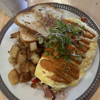 The Sunday - Sunday Omelette with homestyle fries and sourdough - Breakfast & Brunch Near Me - Emeryville, California The Sunday - Sunday Omelette with homestyle fries and sourdough - Breakfast & Brunch Near Me - Emeryville, California