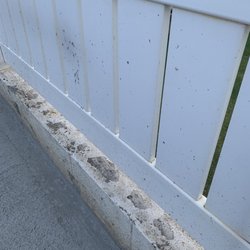 Mevatani - Cement on the fence, didn't bother to wipe
