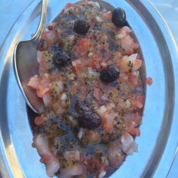 Bar Gilda - Bacalao con picado de cebolleta, tomate y oliva negra - Cocktail Bars Near Me - Lleida, L Bar Gilda - Bacalao con picado de cebolleta, tomate y oliva negra - Cocktail Bars Near Me - Lleida, L