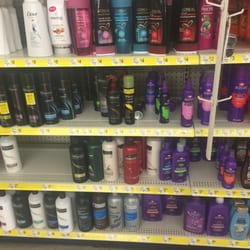Dollar General - Messy shampoo aisle.