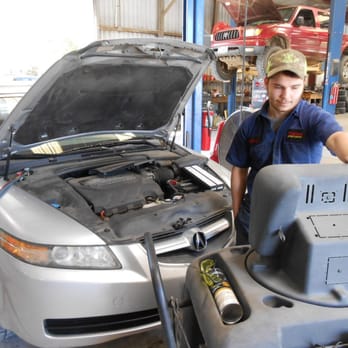 Silsbee Motor Company - This is our tech Anthony working on a customers ac system. - Auto Repair Near Me - Silsbee, Texas