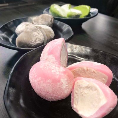 Kura Revolving Sushi Bar by null