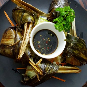 Sweet Basil Restaurant - a plate of food with dipping sauce - Thai Near Me - Ottawa, Ontario Sweet Basil Restaurant - a plate of food with dipping sauce - Thai Near Me - Ottawa, Ontario