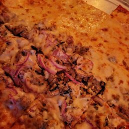Half cheese pizza, half sausage onion and mushroom.