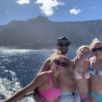 Kauai Sea Tours - Beautiful Napali Coast in the background. The crew doubles as great photographers!! - Boating Near Me - Eleele, Hawaii