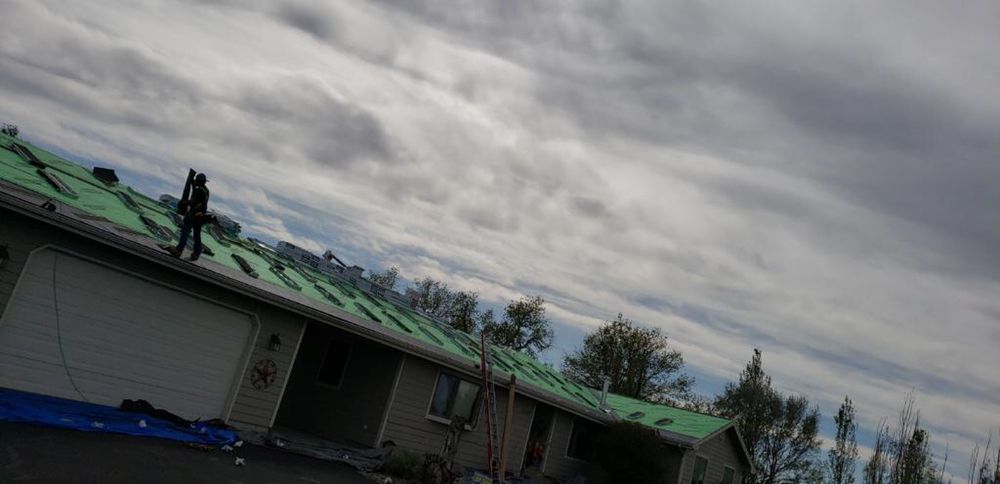 Slide of Osman Roofing Company