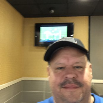 McDonald's - a man in a blue shirt and hat - Burgers Near Me - Portersville, Pennsylvania McDonald's - a man in a blue shirt and hat - Burgers Near Me - Portersville, Pennsylvania