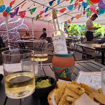 Amor y Tequila - Started with a bottle of wine and guacamole. - Mexican Near Me - Chicago, Illinois