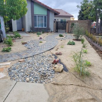 JR Landscape And Design - The DG was installed so thinly and not compacted into a solid surface. As soon as it rained, it all washed away. - Landscaping Near Me