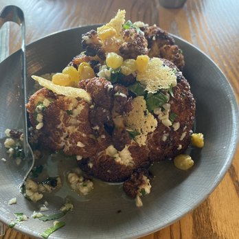 Mint Mark - Cauliflower with bagna cauda, golden raisin, lemon, and crispy sarvecchio. Prepared by first roasting then lightly frying. - Bars Near Me - Madison, Wisconsin Mint Mark - Cauliflower with bagna cauda, golden raisin, lemon, and crispy sarvecchio. Prepared by first roasting then lightly frying. - Bars Near Me - Madison, Wisconsin