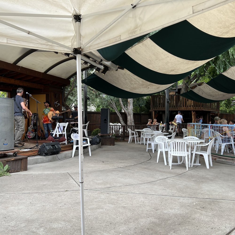 Avogadro's Number - a band playing under a tent - American Near Me - Fort Collins, Colorado Avogadro's Number - a band playing under a tent - American Near Me - Fort Collins, Colorado