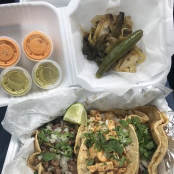 Poncho's Tacos - 3 tacos (left to right: steak, chicken, chorizo) - Tacos Near Me - Wyoming, Michigan Poncho's Tacos - 3 tacos (left to right: steak, chicken, chorizo) - Tacos Near Me - Wyoming, Michigan