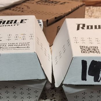 Round Table Pizza - Box of fries, order number one on the left order number two on the right. Order number two has a seal sticker order number one does not. - Pizza Near Me - Citrus Heights, California