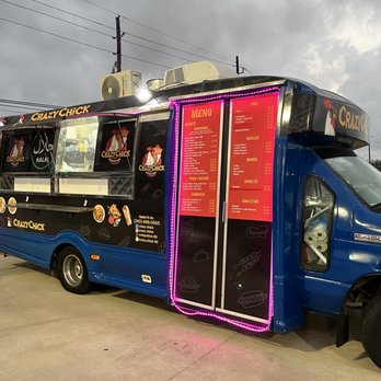 Crazy Chick - Food truck - A blue food truck named Crazy Chick features a menu display on the side, parked outdoors under cloudy skies. - Halal Near Me - Spring , Texas