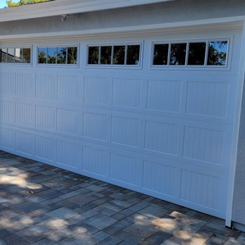 Peninsula Garage Doors - CHI Stamped Shaker with Stockton window 16x7. - Garage Door Services Near Me Peninsula Garage Doors - CHI Stamped Shaker with Stockton window 16x7. - Garage Door Services Near Me