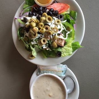 Olive Branch Cafe - House salad, pepperoni's Green ,and black  olives ,Romain lettuce,red onions .and mushrooms.Corn and shrimp bisque soup. - Pizza Near Me - Marrero, Louisiana
