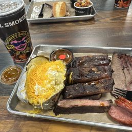 Sweet tea, fully baked potato, sausage, ribs and brisket. Sweet tea, fully baked potato, sausage, ribs and brisket.