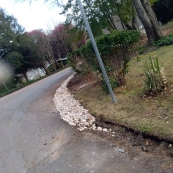 Upstate Yard Pros - Putting french drains all around the property - Landscaping Near Me