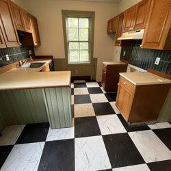Bayview Renovations - New Luxury Vinyl Flooring and backsplash installed
