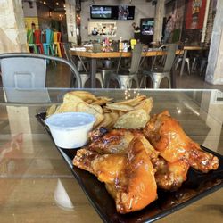 The Outpost Chickasha - The Outpost traditional wings with Outpost sauce, kettle chips, and blue cheese.