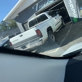 Auto Glass Now - This photo isn't a clear photo but this is the black glue I mentioned that leaked out. - Windshield Installation & Repair Near Me - Tucker, Georgia