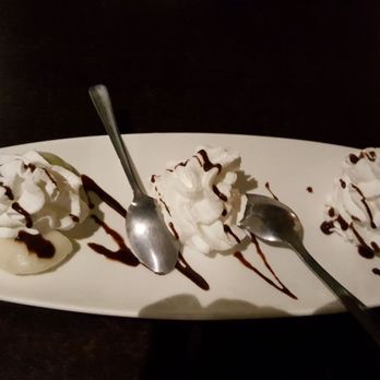 Fusha Asian Bistro - Mochi vanilla and green tea topped with whip cream and fudge - Asian Fusion Near Me - Metuchen, New Jersey