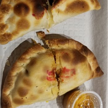 Empanadas Cafe - Hoboken - chicken empanadas with a great crust along with tangy hot sauce (missing in this pic is the chimichirri sauce - please ask for some) - Empanadas Near Me - Hoboken, New Jersey Empanadas Cafe - Hoboken - chicken empanadas with a great crust along with tangy hot sauce (missing in this pic is the chimichirri sauce - please ask for some) - Empanadas Near Me - Hoboken, New Jersey