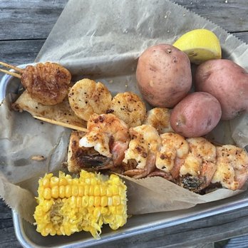 Dewey Destin's Navarre - Corn, shrimp, scallops, potato's, and fish - Seafood Near Me - Navarre, Florida Dewey Destin's Navarre - Corn, shrimp, scallops, potato's, and fish - Seafood Near Me - Navarre, Florida